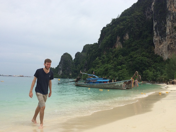 Elliott Killian in Koh Phi Phi island Thailand. He is walking on the beach